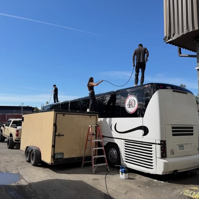 Mobile detailing trailer working beside an airport A-frame